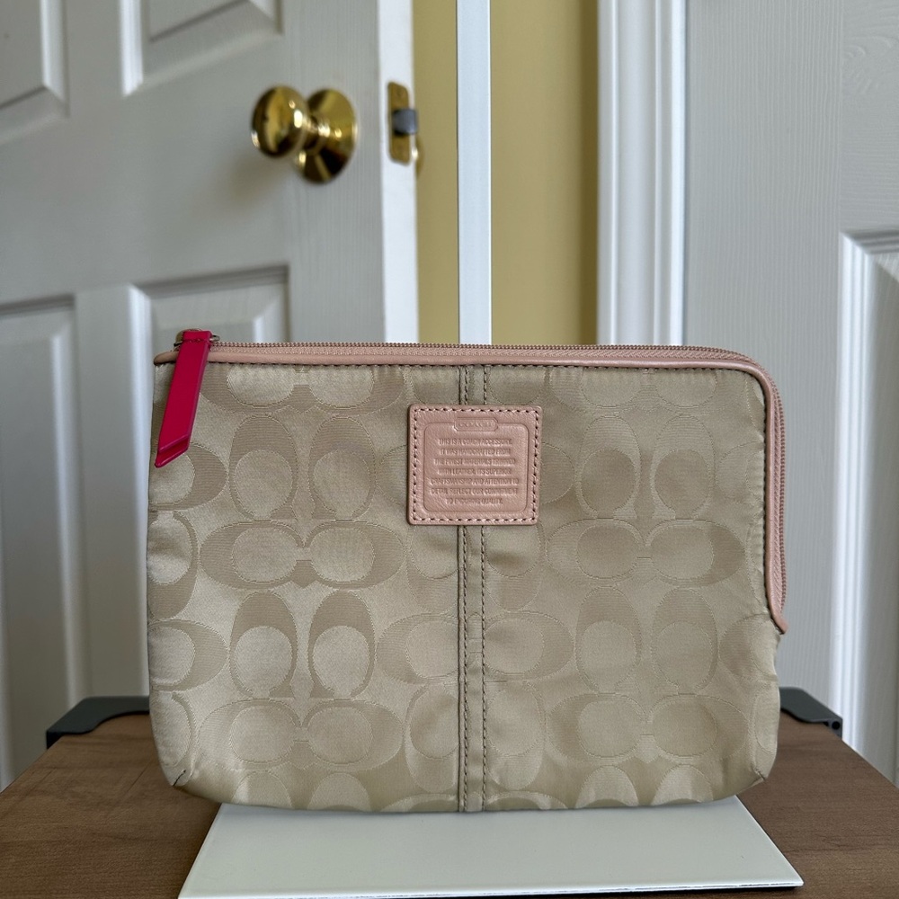 #27. Coach Beige/Pink Padded Envelope or Wristlet